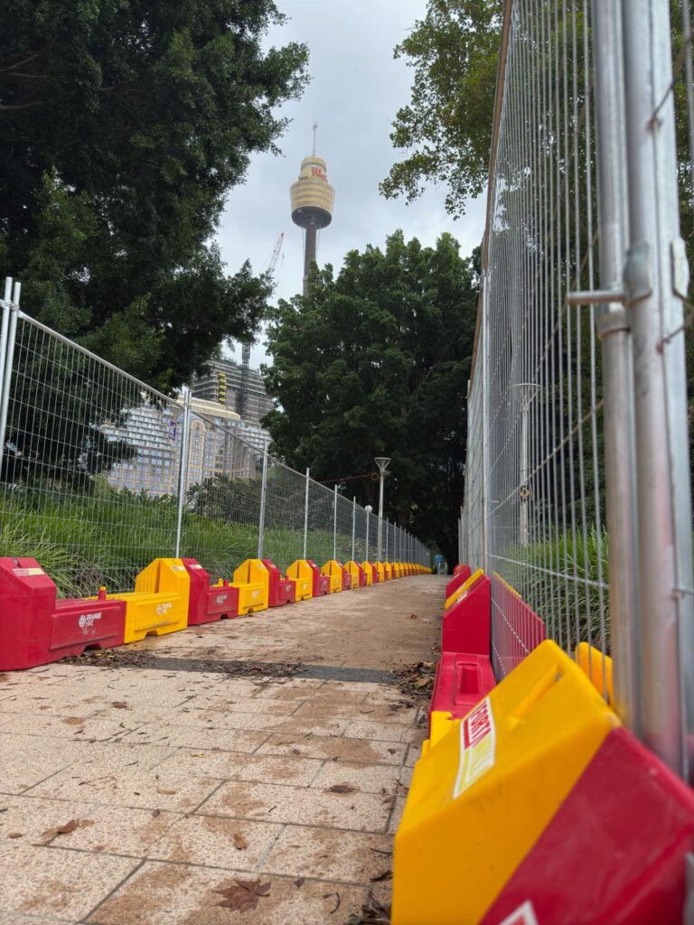 temporary metal hoarding in a park